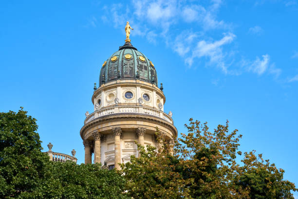 The New Church also known as the German Church on Gendarmenmarkt square. Berlin, Germany. in a cold end of winter day
