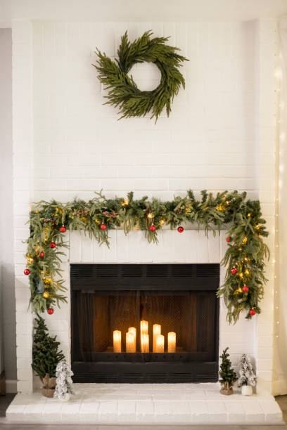 istock Fire place christmas decorations with garland and wreath 2189304436