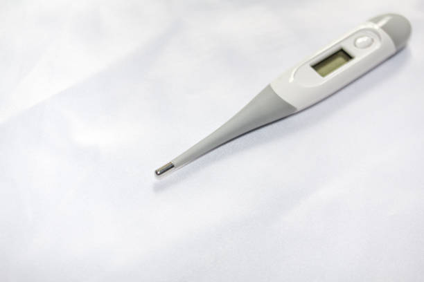 Best Thermometer for home. Three different types of thermometers on white background. Mercury, infrared contactless Thermometer.