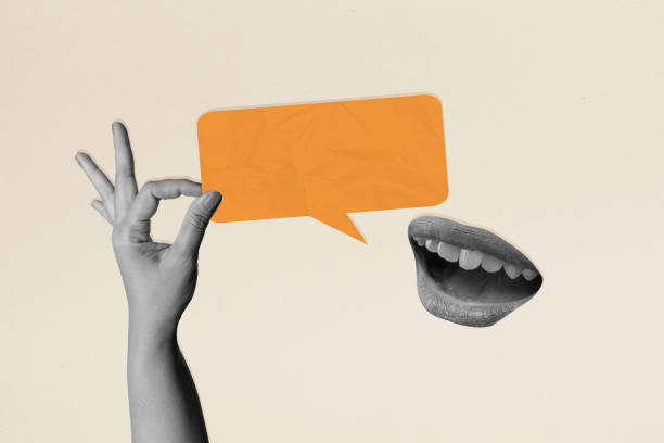 istock A human hand holding a empty speech bubble from a human mouth on a colored background 2189308344