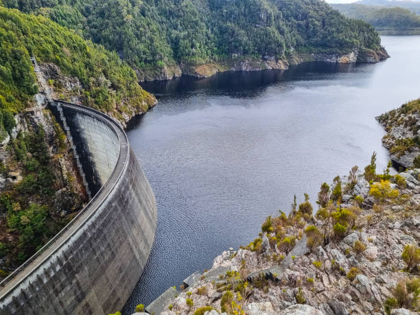 istock Gordon Dam in Tasmania, an impressive concrete structure surrounded by rugged cliffs and a lake in a remote wilderness 2189309430