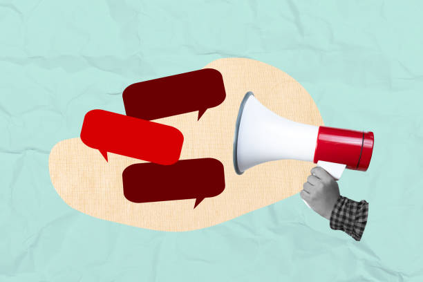 istock A human hand holding megaphone with a speech bubble on a colored background 2189310124