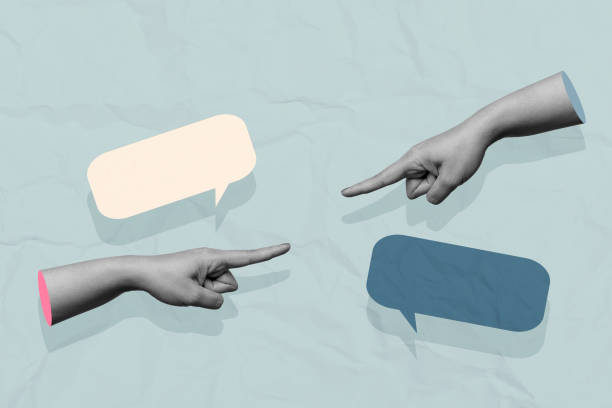 istock A human hand pointing each other and showing a speech bubble with a colored background 2189310135