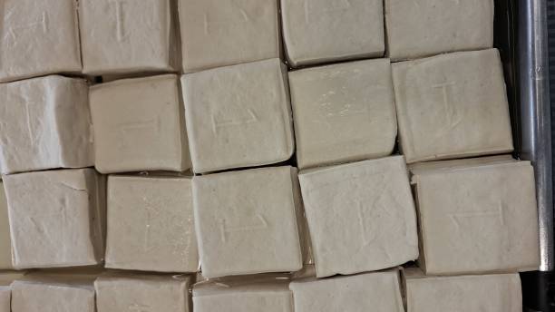 istock Neatly Stacked Tofu Blocks Ready for Distribution 2189310625