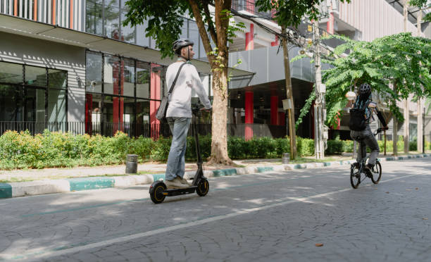 istock Commuting to work with bicycle. Modern diversity people use eco transportation in city. Sustainable lifestyle. 2189314061