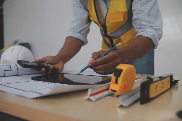 istock Image of engineer meeting for architectural project. working with partner and engineering tools on workplace vintage tone. 2189314930