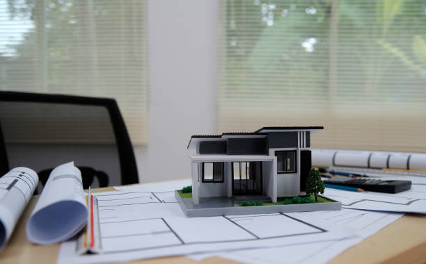 istock Architects, engineers, contractors working in the office with blueprints, inspection engineers Work analysis for architectural plan, construction project sketch, focus, business construction concept. 2189316504