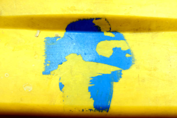 abstract form on old yellow metal