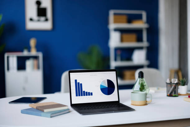 istock Graph of progress on a laptop in a modern office. 2189331653