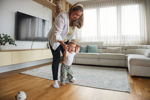 istock First steps of my baby 2189332776