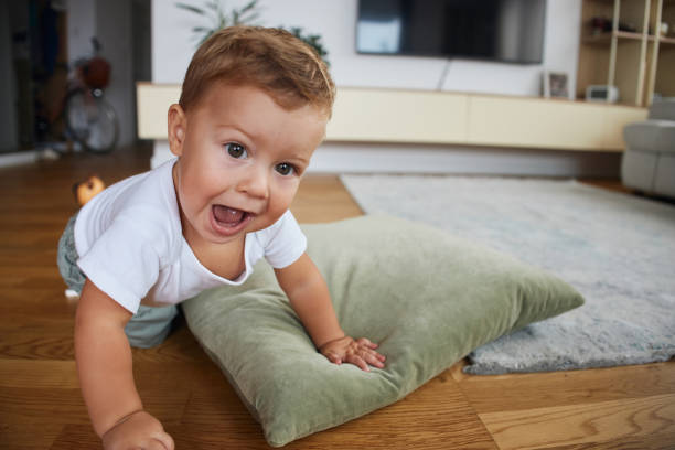 istock Beautiful, happy baby boy playing 2189332957