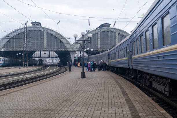 istock Train Station with Arched Roofs and Blue Train 2189334648