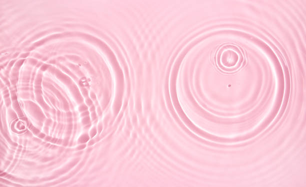 istock water texture ripple wave transparent water abstract background in pink tones 2189335826