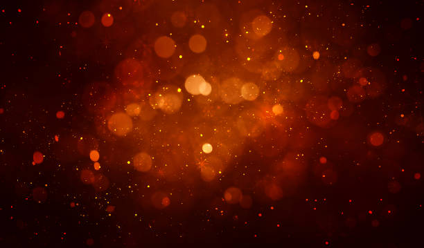 istock Abstract red glittering Christmas background with snowflakes and golden defocused lights 2189335892