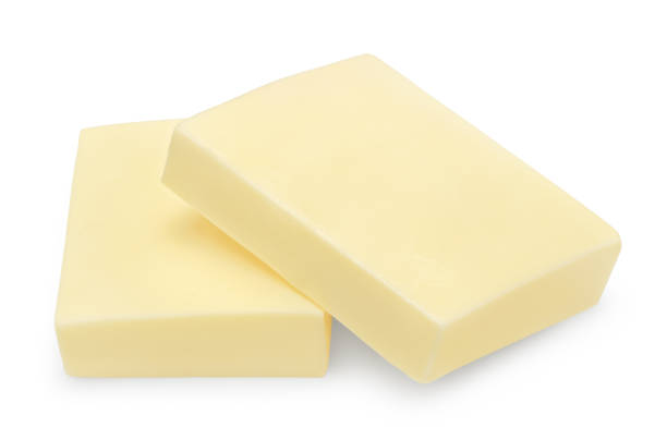 istock Pieces of butter isolated on white background. clipping path 2189336193