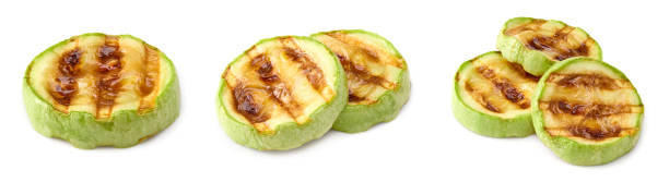 istock grilled sliced zucchini isolated on white background. clipping path 2189336472
