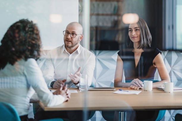 Business persons discussing financial plan