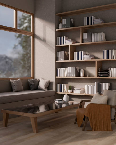 istock A cozy contemporary beige living room featuring a coffee table, a sofa, a bookshelf, and decor. 2189338123