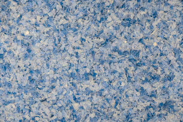 istock Close-up of grounded recycled polyethylene terephthalate (PET) plastic flakes 2189338953
