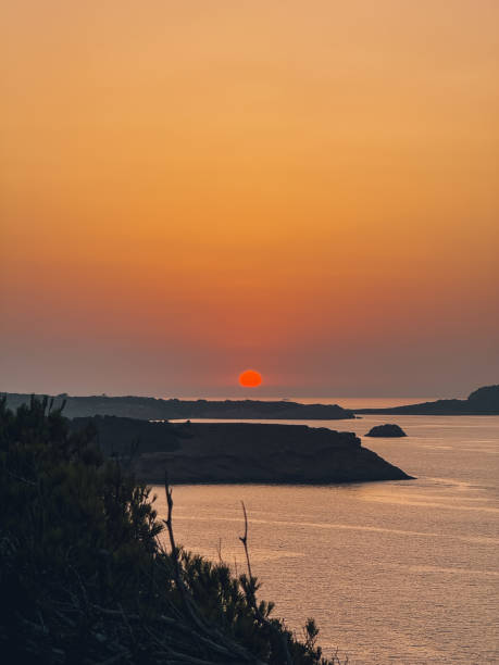 cliff and susnset in ibiza island