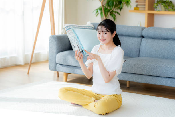 istock young woman calling on smartphone 2189340118