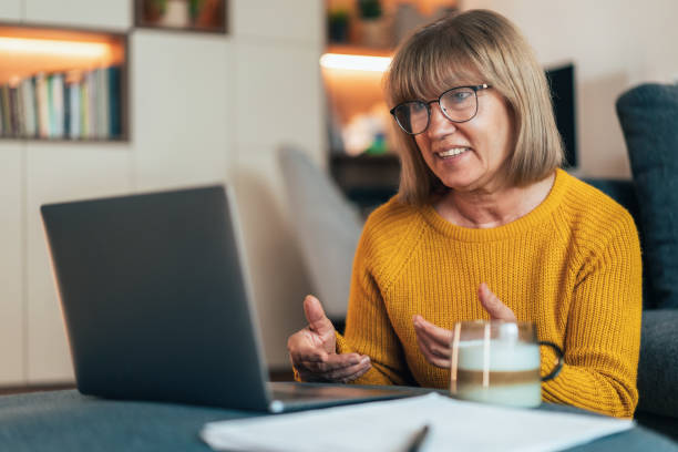 istock Senior woman having video call 2189341691