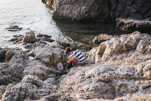 Asian girl playing in the seaside