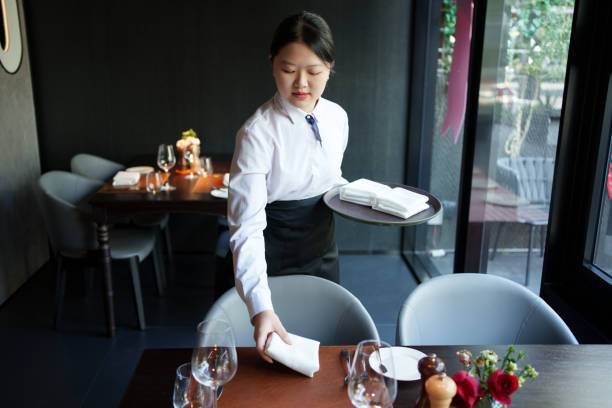 istock Asian waiter working in high-end restaurant 2189342760