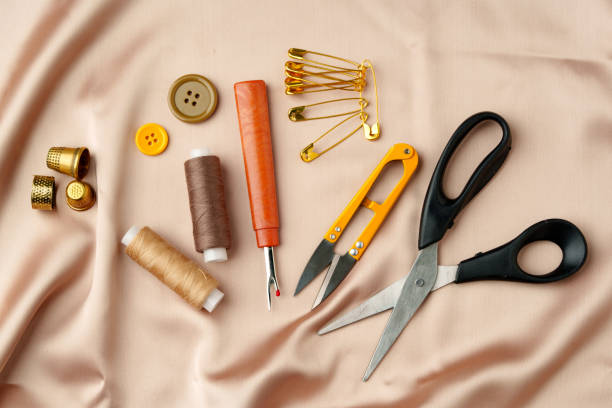 istock Sewing tools and materials arranged on soft fabric showcasing essential crafting supplies for creative projects 2189343211