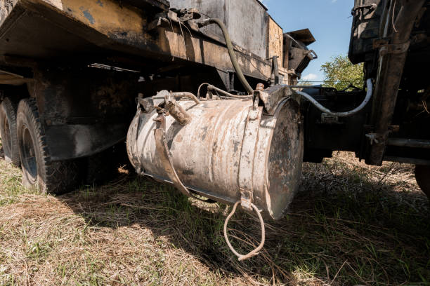 istock Rusty Equipment Hanging from a Truck on a Sunny Day 2189344436