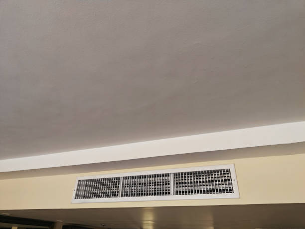 istock Ceiling vent is installed in a neutral-colored room, contributing to air circulation and comfort in the living area 2189344694