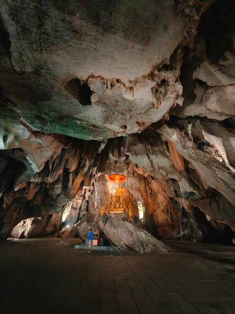 istock Buddha statue in the cave at  Thailand 2189345258
