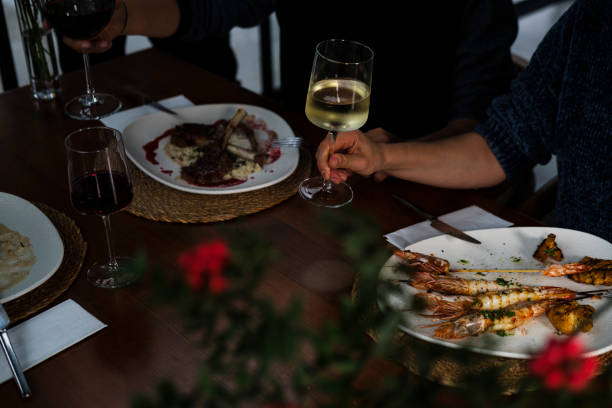 istock group of three people dining or having lunch in restaurant cafe drinking wine 2189345881