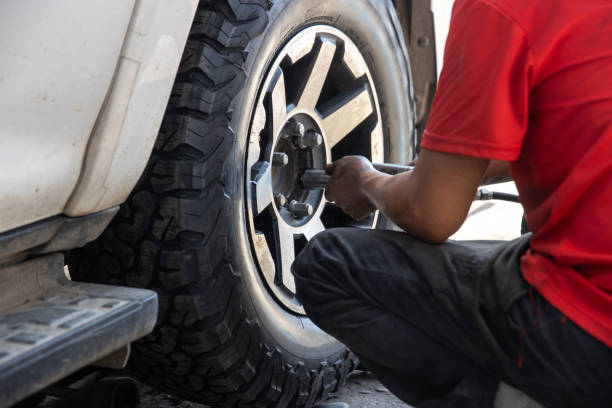 istock Mechanic changing a wheel of a modern car 2189346792