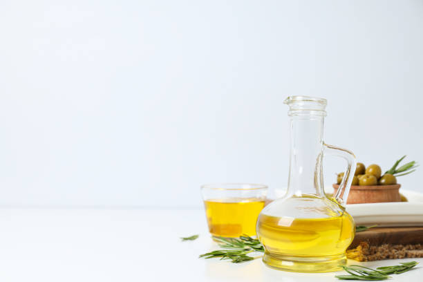 istock Olive oil and olives on white background, space for text 2189348789