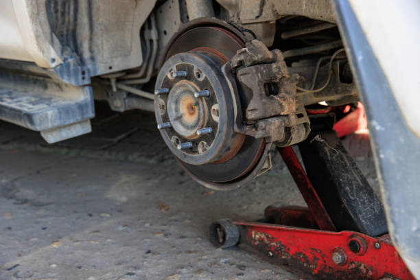istock Mechanic changing a wheel of a modern car 2189350964