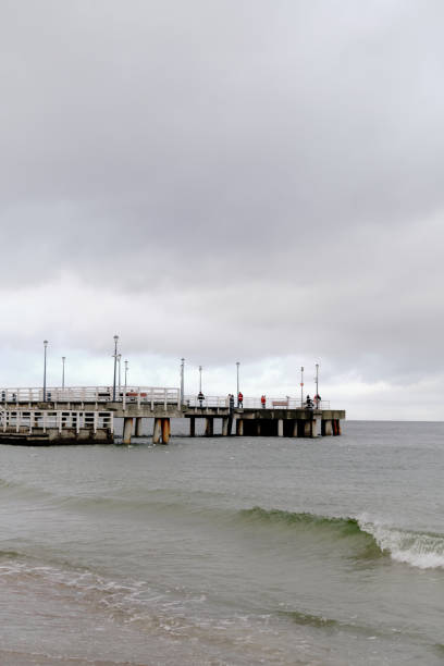 istock Clouds and Rain over the Black Sea, seagull, pier 2189354596
