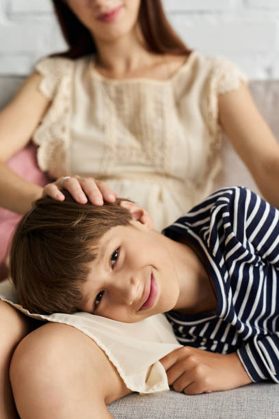 istock Heartwarming moments between mother and son in a modern studio setting 2189358327