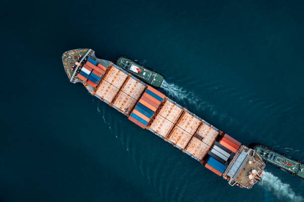 istock shipping logistic cargo container ship in black sea import export goods and distributing products to dealer and consumers across worldwide, by container ship transport business, industry service. cinematicphotography process. 2189360765