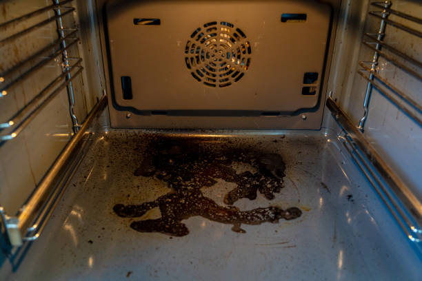 istock Close up inside view of dirty oven with deposits on bottom 2189362248