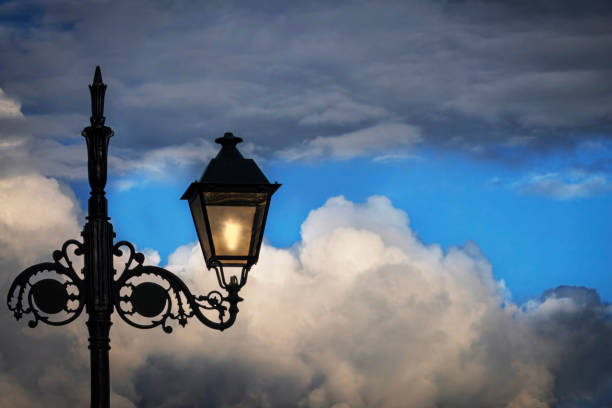 Street lamp with clouds in the background in Berat, Albania