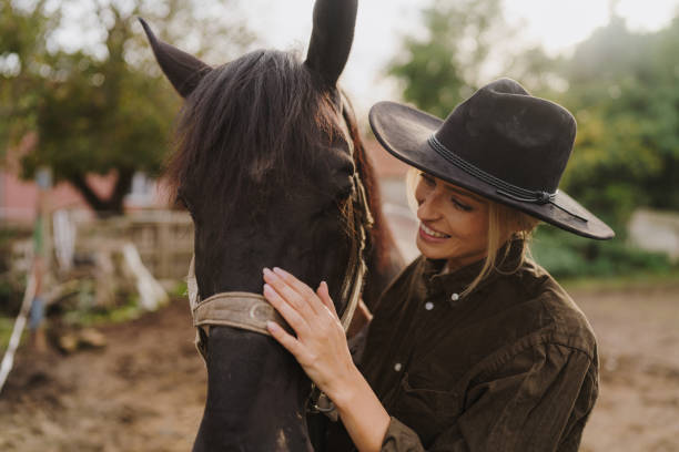 istock Gentle moment between a woman and her horse 2189363135