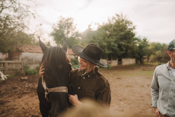 istock Gentle moment between a woman and her horse 2189363138