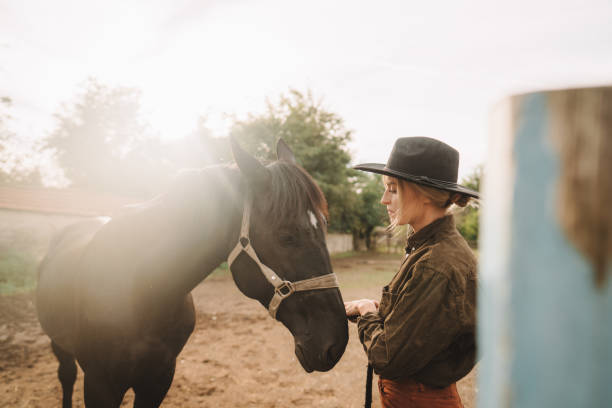 istock Gentle moment between a woman and her horse 2189363143