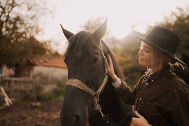 istock Gentle moment between a woman and her horse 2189363153