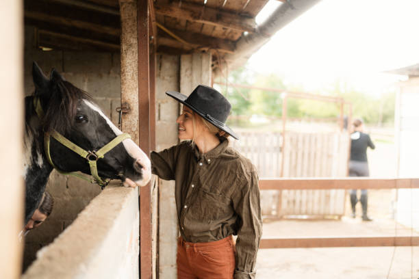 istock Gentle moment between a woman and her horse 2189363158
