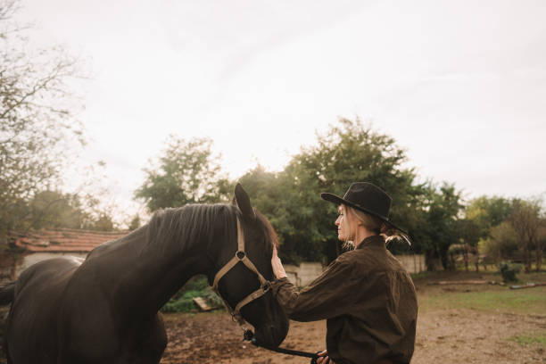istock Gentle moment between a woman and her horse 2189363173