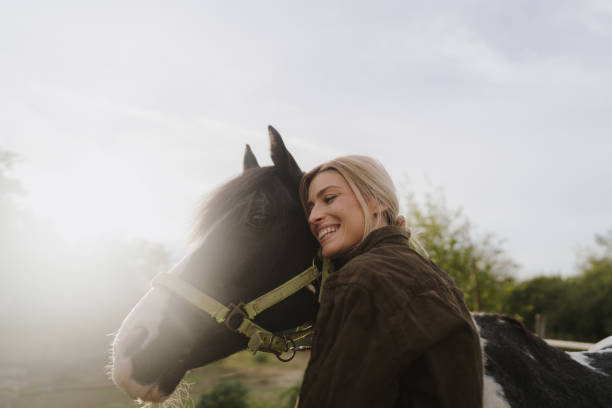 istock Gentle moment between a woman and her horse 2189363181