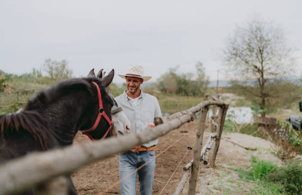 istock Man at the horse ranch 2189363206