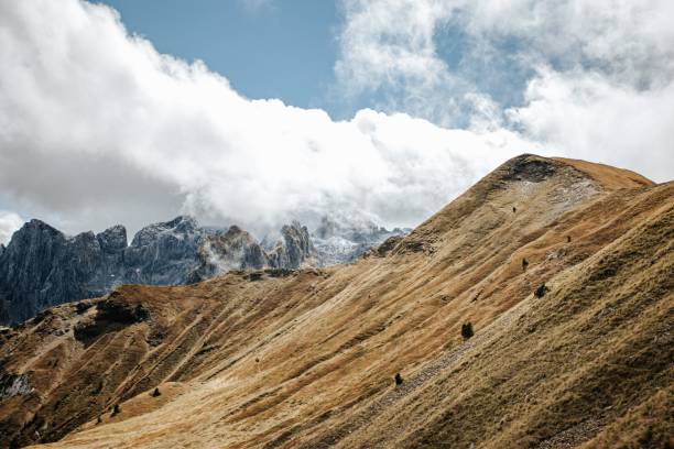 istock Scenic view of hills and mountains under clouds. 2189365390